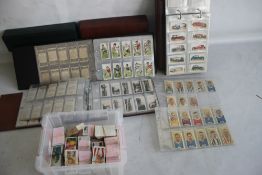 A QUANTITY OF CIGARETTE CARDS IN THREE ALBUMS AND LOOSE to include Football and cricket - John