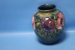 A MOORCROFT ANEMONE VASE GREEN PAINTED SIGNATURE MARK ALONGSIDE IMPRESSED FACTORY MARKS, APPROX.