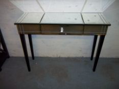 A MODERN MIRRORED SOFA/ HALL TABLE.