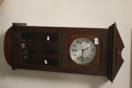 AN ENFIELD HANGING WALL CLOCK