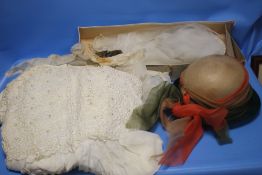 A VINTAGE WEDDING DRESS TOGETHER WITH A VEIL AND A HAT