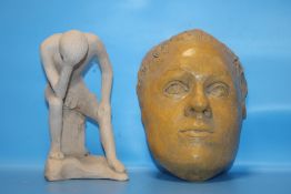 AN ART POTTERY DEATH MASK AND A FIGURE