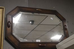 AN OAK FRAMED MIRROR 67 X 46 CM