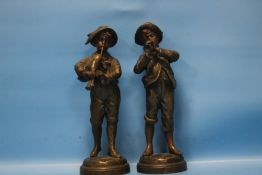 A PAIR OF COLD PAINTED FIGURES OF BOYS SIGNED KEFFLER, ONE PLAYING THE BAGPIPES, THE OTHER A HORN