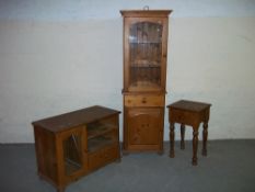 THREE ITEMS: SOLID PINE DISPLAY CABINET AND A MEDIA TV UNIT AND A SOLID PINE TABLE.