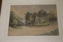 A FRAMED AND GLAZED WATERCOLOUR OF A COTTAGE SCENE SIGNED F.I. NAYLOR