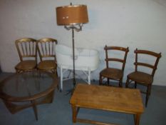 EIGHT ITEMS TO INCLUDE: AN OAK COFFEE TABLE CHAIRS, A LOOM BABIES CRIB, A BRASS LAMP ETC.