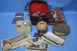 A TRAY OF COLLECTABLES TO INCLUDE POSTCARDS, MONEY BANKS, TEA CARDS ETC.