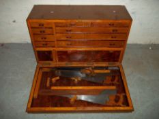 A CARPENTERS TOOL BOX AND CONTENTS INCLUDED.