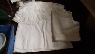 A VINTAGE LINEN TABLECLOTH WITH CHINESE STYLE DRAGON EMBROIDERY TOGETHER WITH TWO OTHER LINEN