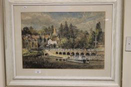 A FRAMED AND GLAZED WATERCOLOUR OF A RIVERSIDE SCENE