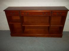 A YEW LOW WIDE BOOKCASE