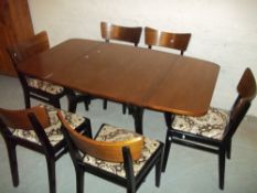A G-PLAN DROPLEAF TABLE AND SIX CHAIRS