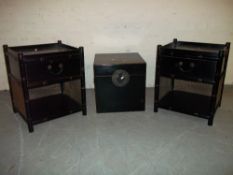 THREE MODERN ITEMS: A STORAGE CUBE BOX AND 2 SIDE TABLES WITH DRAWERS.