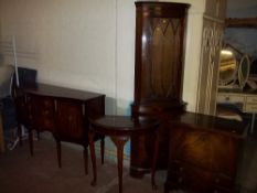 A SERPENTINE FRONTED MAHOGANY SIDEBOARD TOGETHER WITH A HALF MOON HALL TABLE AND A CORNER DISPLAY