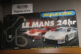 A BOXED SCALEXTRIC LE MANS 24 HOUR PORSCHE 911 SET, COMPLETE WITH ADDITIONAL COLLECTABLE CAR