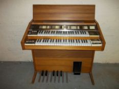 A PHILIPS PHILICORDA TEAK ORGAN.