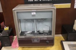 A CASED SET OF VINTAGE RELEASE-O-MATIC SCALES A/F