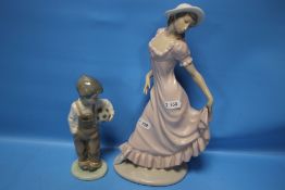 A NAO FIGURINE AND A NAO FIGURE OF A BOY