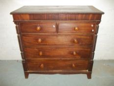 A SCOTTISH MAHOGANY ANTIQUE TWO OVER THREE CHEST OF DRAWERS 120CM WIDE.