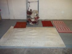 A LARGE SELECTION OF RUGS.