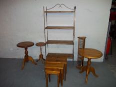 FIVE ITEMS INCLUDING: AN IRON/PINE BOOK SHELF, TWO SOLID PINE ROUND TABLES AND A NEST OF THREE