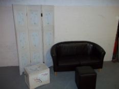 A TWO SEATER TUB SOFA AND POUFFEE AND A DECORATED PRIVACY SCREEN AND STORAGE BOX.