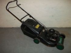 A TROJAN PETROL 18 INCH LAWNMOWER.
