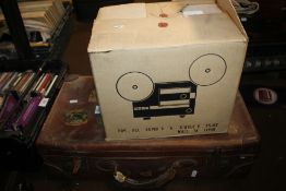 A VINTAGE SUITCASE TOGETHER WITH A SUPER-8 FILM PROJECTOR