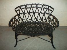 A CAST 2 SEATER GARDEN BENCH NEEDS 1 BOLT IN LEG.