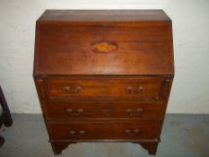 AN EDWARDIAN INLAID WRITING BUREAU.