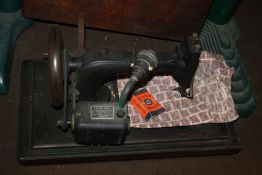 A VINTAGE BRITISH MADE SEWING MACHINE