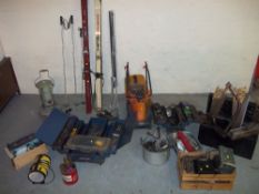 A SELECTION OF TOOLS TO INCLUDE TOOL BOXES, A WELDER, SKIS, A PARAFFIN HEATER, A FLYMO MOWER ETC.