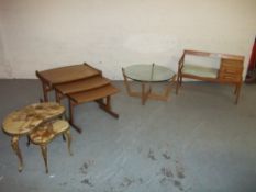 FOUR ITEMS TO INCLUDE: A CHIPPY HEATH SEAT, A G PLAN TEAK LARGE NEST OF TABLES, A KIDNEY SHAPED NEST