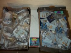 A LARGE SELECTION OF BRASS HOOKS.