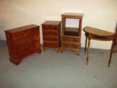 A BOWED BURR HALL TABLE, A LOW BOOKCASE AND 2 HIFI UNITS (4 ITEMS).