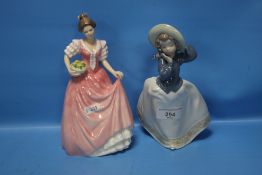 A ROYAL DOULTON FIGURINE 'MISS KAY' HN3659 TOGETHER WITH A NAO FIGURINE (2)