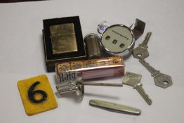A QUANTITY OF COLLECTABLES TO INCLUDE A BOXED ZIPPO LIGHTER