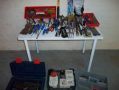 A SELECTION OF TOOLS TO INCLUDE SCREWS AND TOOL BOXES.