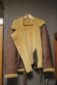 A SHEEPSKIN LINED PILOT'S FLYING JACKET