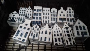 A TRAY CONTAINING FOURTEEN KLM BOLS DELFT PORCELAIN HOUSES