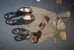 A MILITARY UNIFORM WITH TWO PAIRS OF BOOTS ETC.