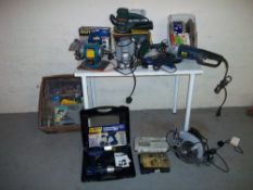 A SELECTION OF POWER TOOLS TO INCLUDE A LARGE POWER CRAFT GRINDER, A JIGSAW, A BOSCH A CORDLESS
