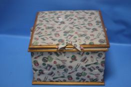 A SEWING BOX WITH CONTENTS