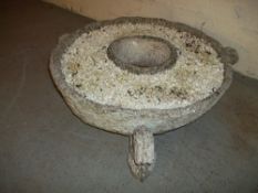 A LARGE PLANTER ON STANDS