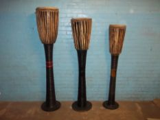 THREE HIGH STANDING ORIENTAL DISPLAY DRUMS - EX SHOP DISPLAY