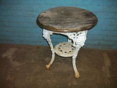 AN ANTIQUE BRTTANIA CAST IRON PUB TABLE BY GASKELL & CHAMBERS LTD.