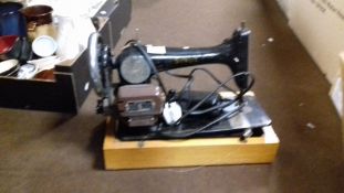 A SINGER SEWING MACHINE