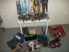 A SELECTION OF TOOLS AND TOOL BOXES.