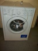 AN INDESIT WASHING MACHINE